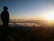 Man admiring sunrise, Pico da Bandeira, Brazil