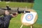 Man aiming crossbow at targets