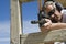 Man Aiming Machine Gun At Firing Range