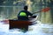 Man alone on a beautiful lake on a kayak