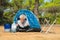 Man alone with tent for adventure camping