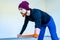 man with amputee hand training with elastic band in gym