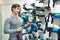 Man with angle grinder in hardware store