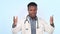 Man, angry doctor and screaming for stress in studio isolated on a blue background. Frustrated African medical