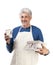 The man in an apron prepares food on a white background