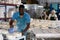 Man in apron working in ceramic workshop