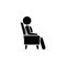 Man in the armchair icon. A man resting in a chair