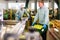 Man arranges crates with harvest of apples at apples factory