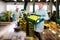 Man arranges crates with harvest of apples at apples factory