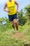 Man athlete running outside on fitness trail run