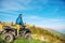 Man on the ATV Quad Bike on the mountains road.