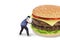 Man avoiding a big burger