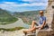 A man on the background of a view of the Mtkvari River flowing into the Aragvi. Mtskheta Georgia 2019