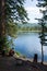 A man with a backpack admiring alpine lake. Silver Lake, Uinta-Wasatch-Cache National Forest (UT)