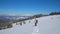 Man backpacker tourist walking snow landscape