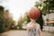 Man balancing basketball on his thumb