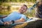 Man with a beard in a hammock in nature.