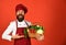 Man with beard on red background. Cook with excited face