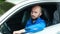 Man with beard sitting in his passenger car