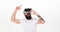 Man with beard in VR glasses dancing, white background. Virtual party concept. Hipster on shouting face having fun in