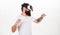Man with beard in VR glasses fighting, white background. Guy with head mounted display fighting in virtual reality