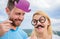 Man with beard and woman having fun party. Add some fun. Making funny photos birthday party. Just for fun. Humor and