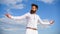 Man bearded hipster formal clothes looks sharp sky background. Reached top. Power and freedom. Hipster with beard and
