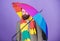 Man bearded hipster hold colorful umbrella. It seems to be raining. Rainy days can be tough to get through. Prepared for