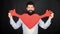 Man bearded hipster hug heart. Make him feel loved every day. Celebrate valentines day. Guy with beard and mustache in