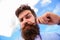 Man bearded hipster with mustache sky background. Ultimate beard and moustache grooming guide. Expert tips for growing