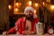 Man bearded hipster santa with red hat celebrate with champagne drink. Christmas holiday. Lonely on christmas eve. Happy