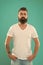 Man bearded hipster stylish beard turquoise background. Barber tips maintain beard. Stylish beard and mustache care