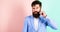 Man bearded hipster twisting mustache pink blue background. Ultimate moustache grooming guide. Expert tips for growing