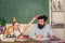 Man bearded pedagogue study together with kid. Reward and punishment principle. Help study. Discipline and upbringing