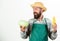 Man bearded presenting corncob maize and cabbage white background isolated. Hipster gardener in apron hold vegetable