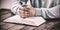 Man with bible praying at desk