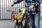 Man and bicycle basket full of groceries