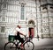 Man on bicycle in front of santa maria del fiore