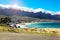 Man on bicykle enjying view at Cape Town Camps Bay on sunny warm day