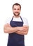 Man in blue apron with arms crossed