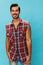 Man blue confident friendly guy background smile attractive plaid travel shirt happy arm trendy