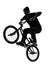 Man bmx acrobatic figure silhouette