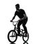 Man bmx acrobatic figure silhouette