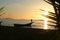 Man on the boat at sunset