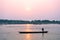 Man on boat at sunset, Chitwan Nepal