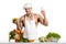 Man bodybuilder in white toque blanche and cook protective apron