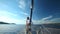 Man on the bow of sailing boat on Mediterranean sea.