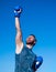 Man boxer on stadium. fitness gym outdoor. muscular athletic guy training in boxing gloves. sport success. male fitness