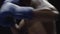 Man with Boxing gloves Boxing in front of the camera close up. Close-up of young man punching. Boxer performing uppercut