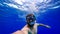 Man in breathing tubes and masks plunges to the bottom of the red sea a bearded man is engaged in snorkeling